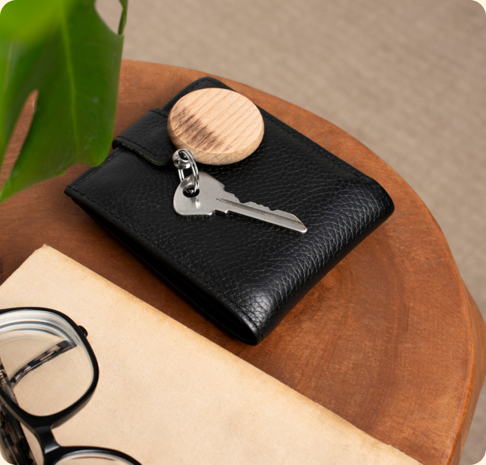 Wallet, keys and glasses on a side table
